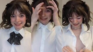 Showing us her small tits